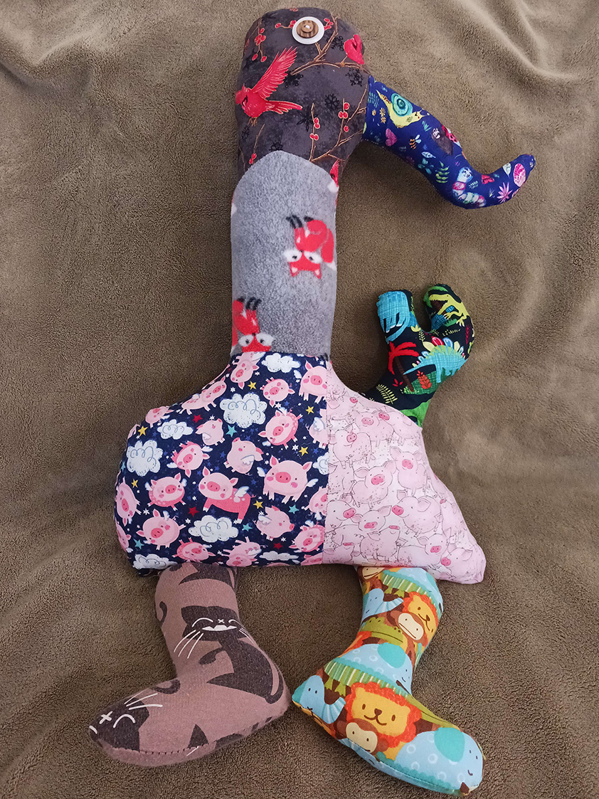 The other side of the doll that looks the same as the previous side.