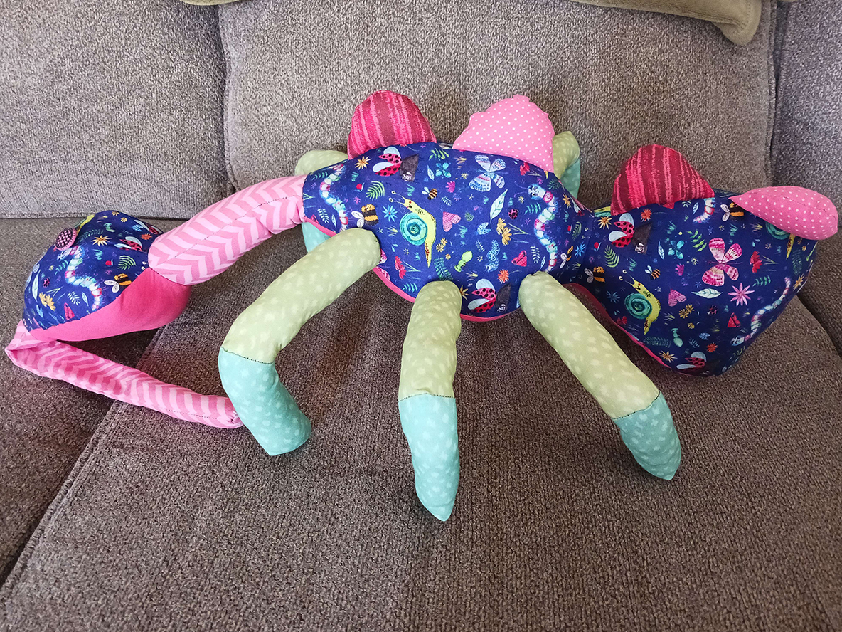 The other side of the same doll which looks exactly the same.