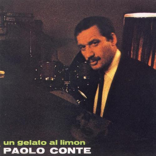 The cover of Un gelato al limon by Paolo Conte. It is a picture of Conte at his piano with some drums behind him. The album title and artist name is in the bottom left corner.