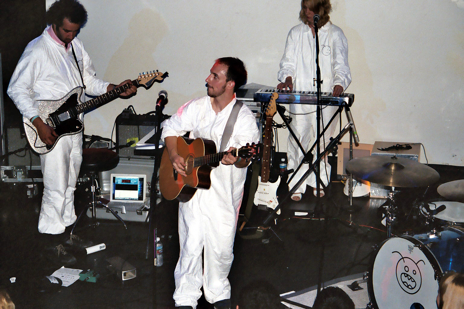 Burns with his band on stage.