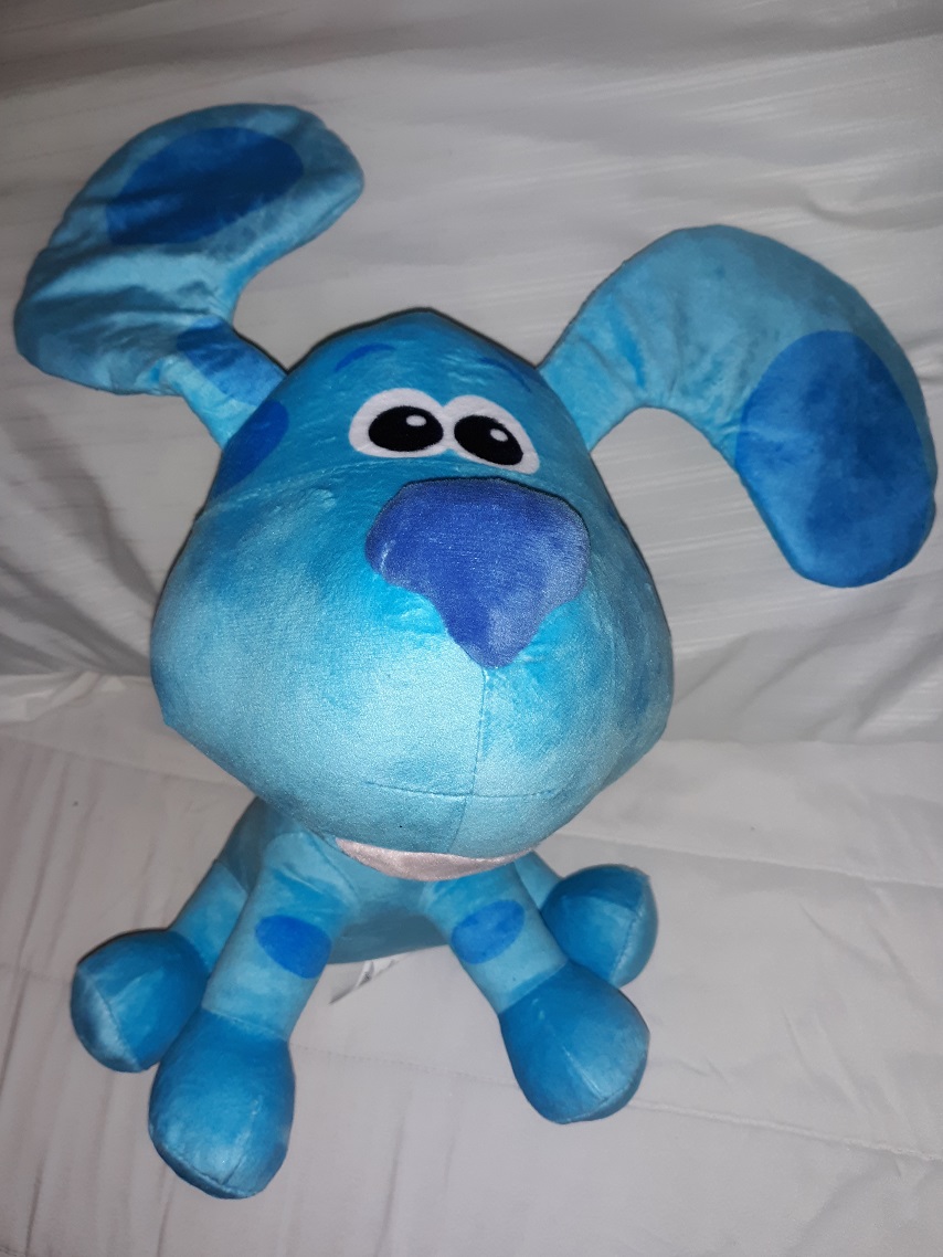 A very large plush doll of Blue. She is in her default stance of all fours. Her ears are sticking up.