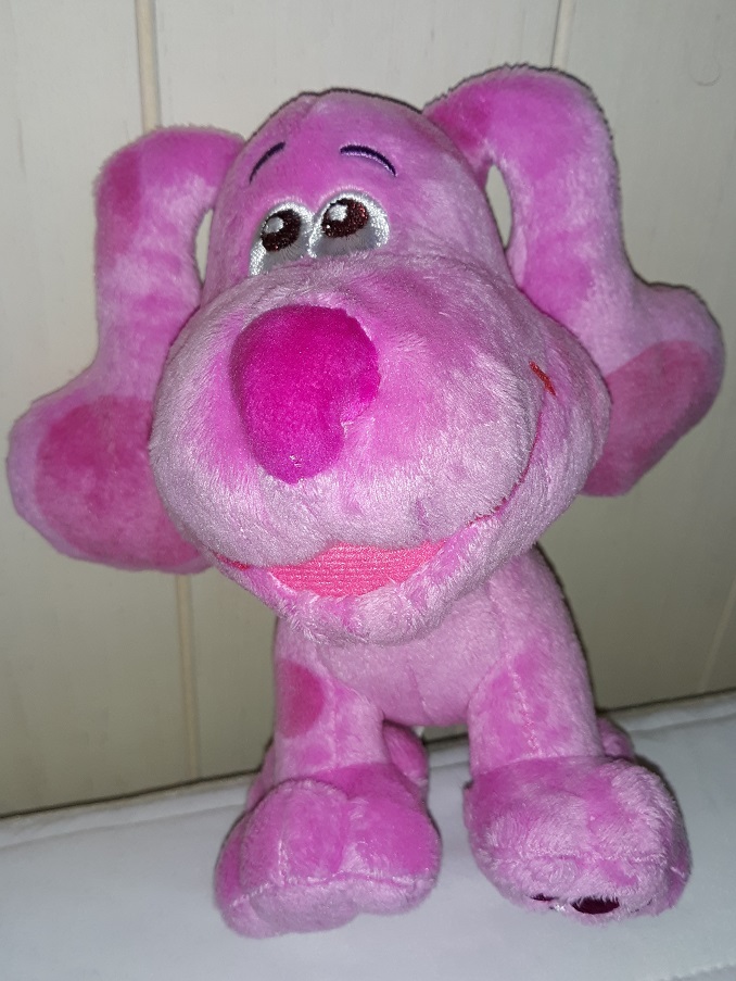 A plush doll of Magenta that is on all fours. She has no glasses with embroidered eyes and fabric nose. Her mouth is open in a smile.