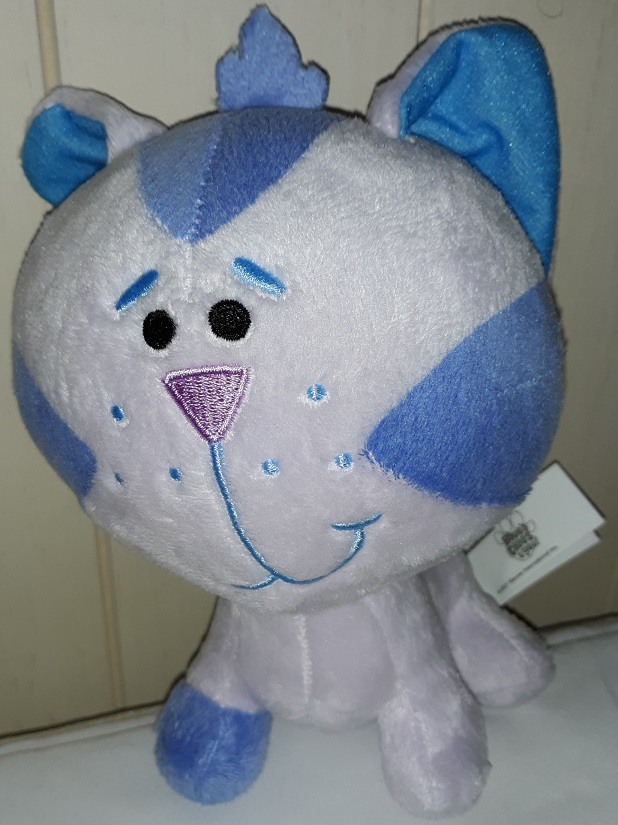 A plush doll of Periwinkle who is on all fours. He has an embroidered face with a smile.