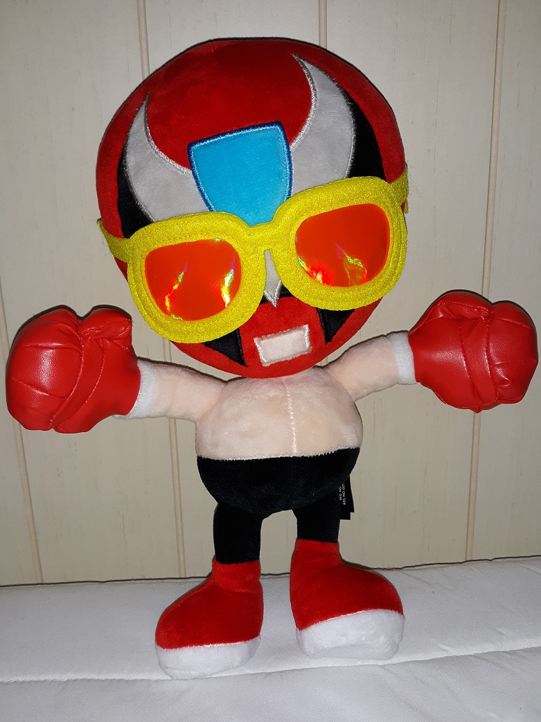 A plush doll of Strong Bad from Homestar Runner wearing his Dangeresque sunglasses.