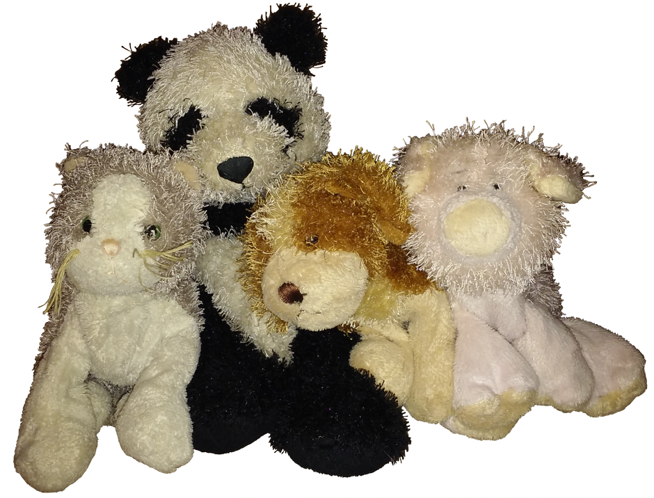A transparent group photo of Webkinz dolls. From left to right is a grey and white cat, panda bear, cocker spaniel dog, and pink pig.